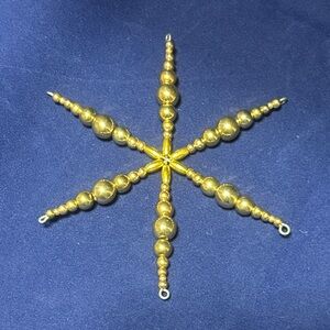 Gold Starburst Holiday Ornament